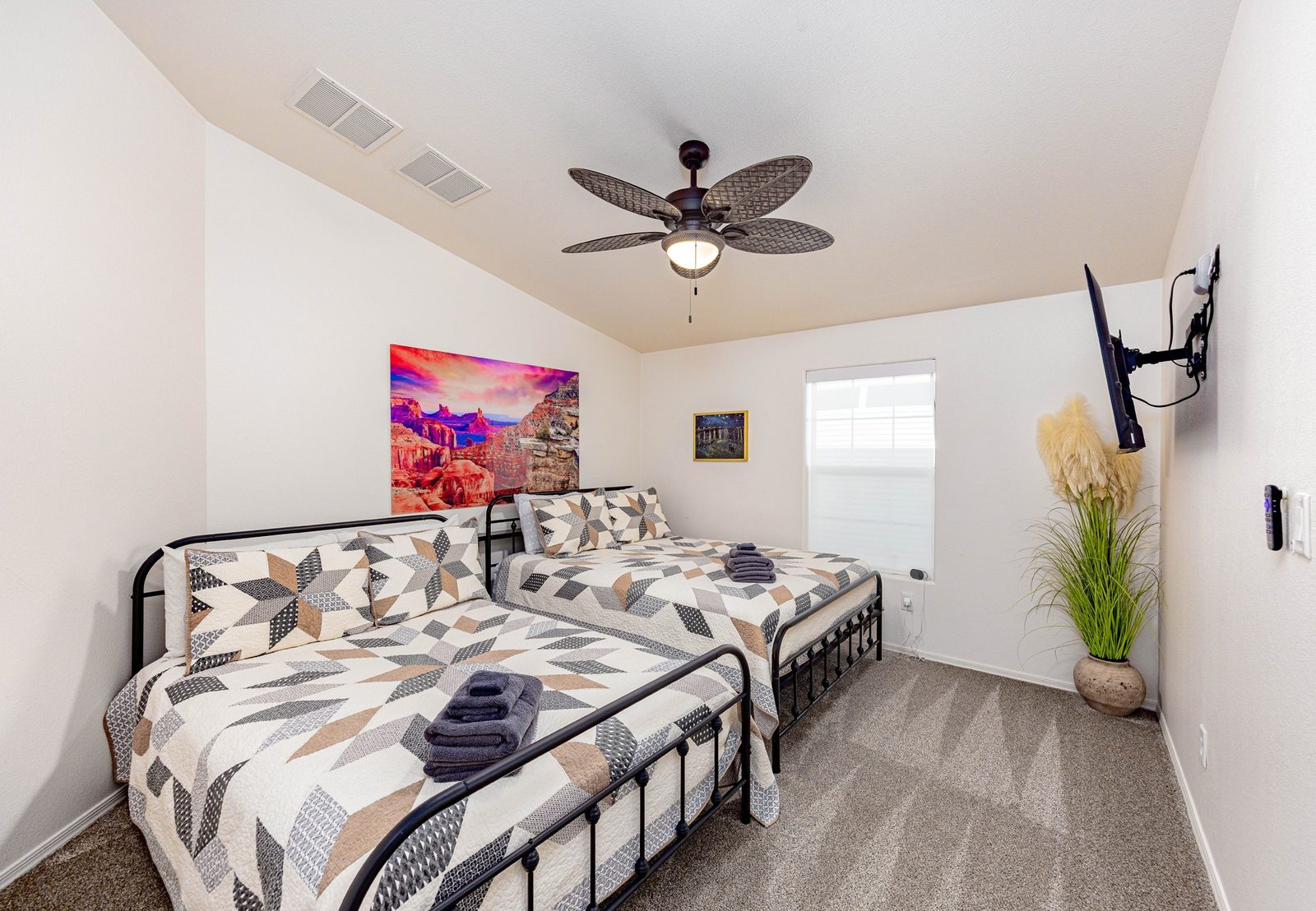 Guest room with multiple beds